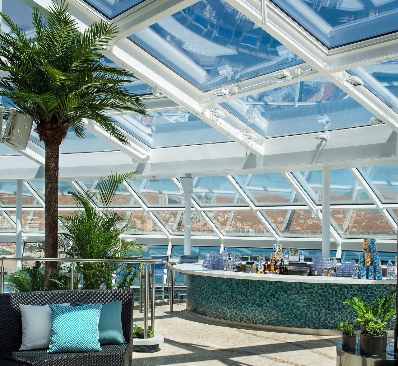 Spectrum of the Seas Solarium lounge and pool atmosphere